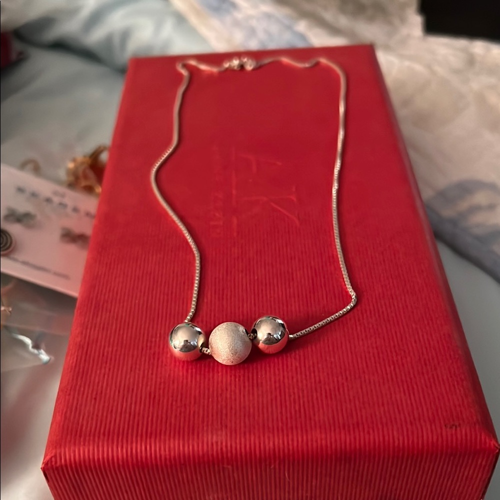 Elegant Silver Necklace with Beads
